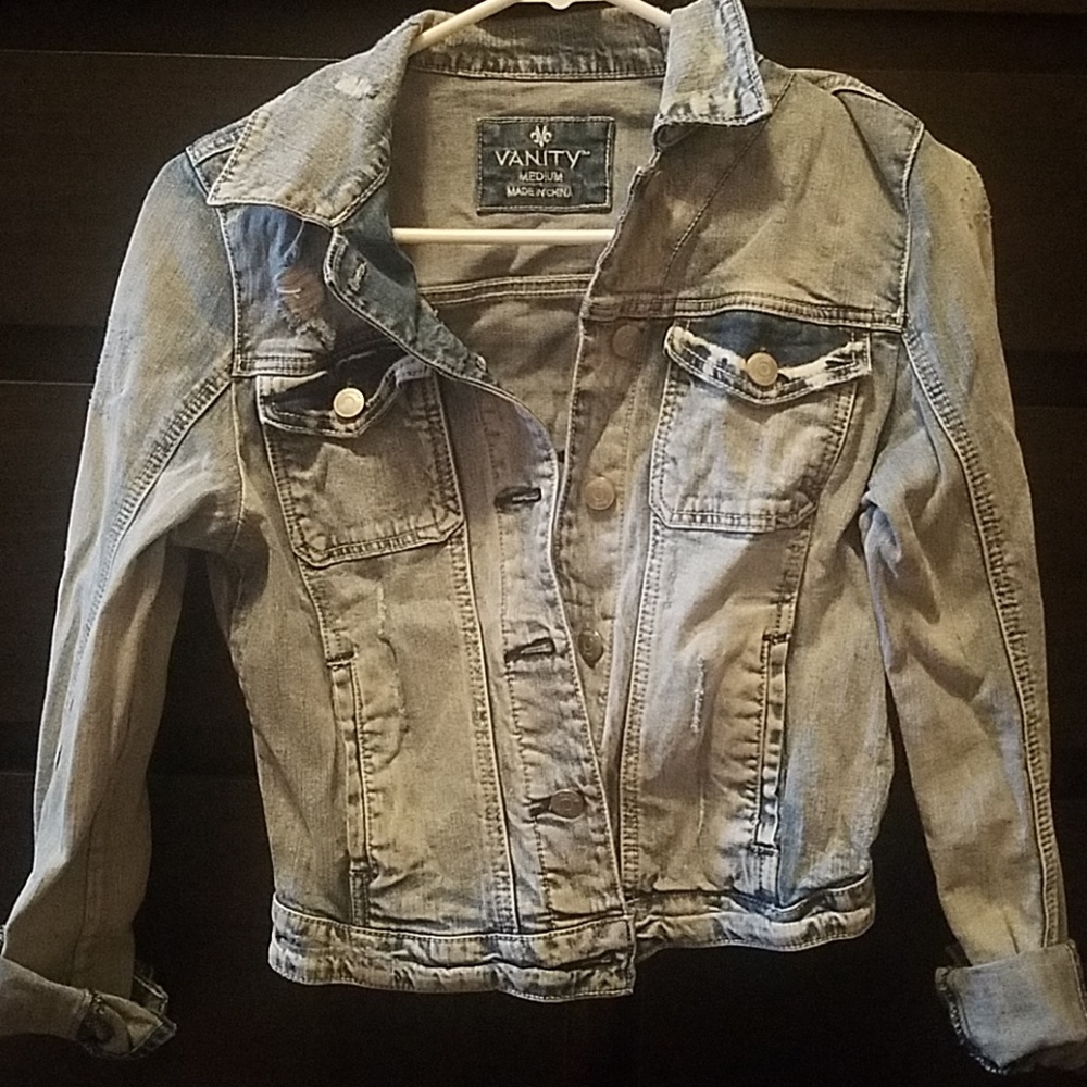 Distressed denim jacket